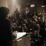 Image: Speaker in Conference Auditorium